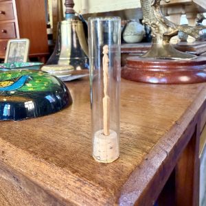 Micro Carved Figure In A Tube